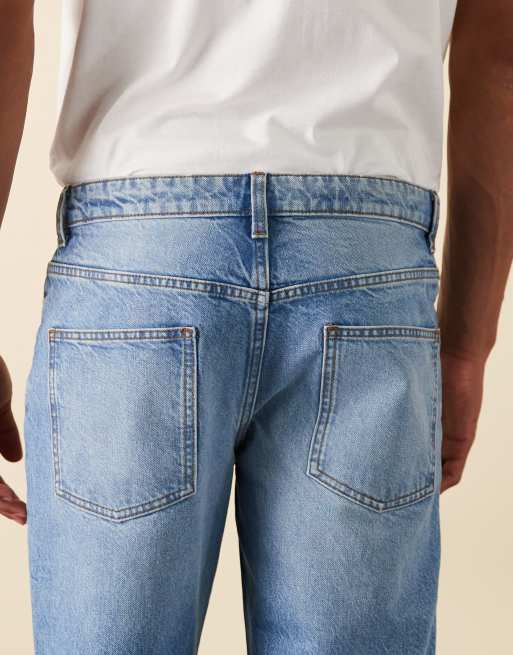 Tapered fit-jeans i let forvasket blå fra ASOS DESIGN, 5 af 6
