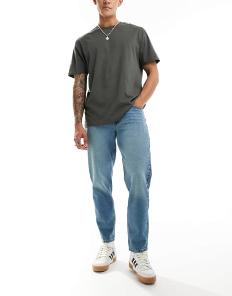 Tapered fit-jeans i medium forvasket blå fra ASOS DESIGN - view 1
