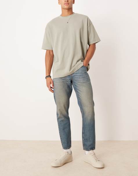 Tapered fit-jeans i medium forvasket blå fra ASOS DESIGN - view 1