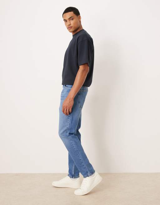 Tapered fit-jeans i mellemforvasket look fra ASOS DESIGN , 2 af 5