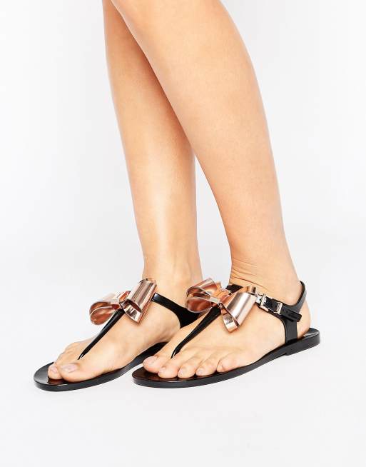 Ted Baker Ainda Black and Gold Bow Toe Post Sandals | ASOS