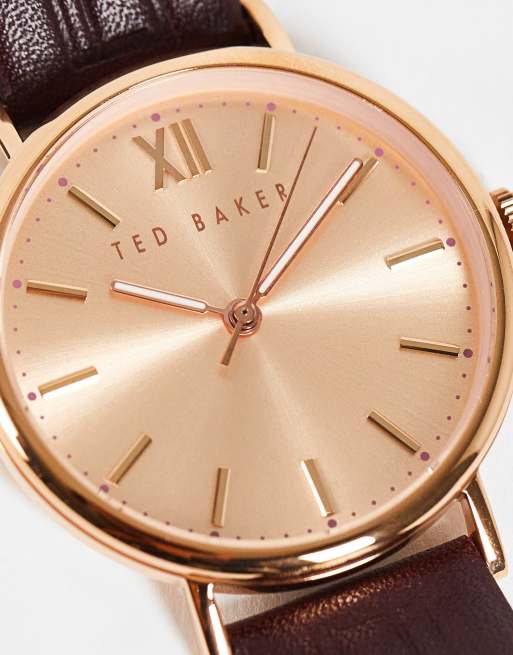 Ted Baker - Armbåndsur med guldfarvet urskive i rustfrit stål og bordeaux læderrem med prægeede detaljer, 3 af 4