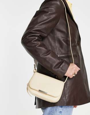 Ted Baker Bagira curved baguette cross body bag in cream