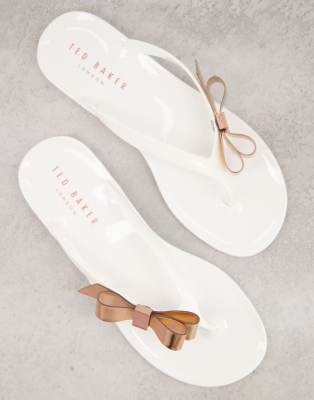 white jelly flip flops