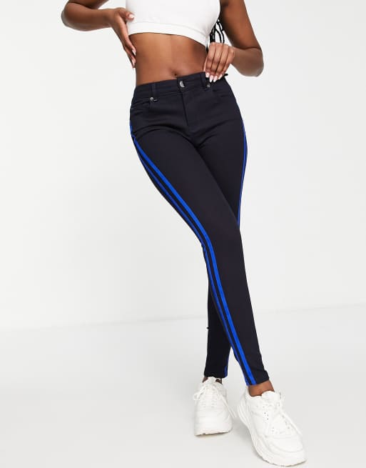 Skinny pants with side hot sale stripe