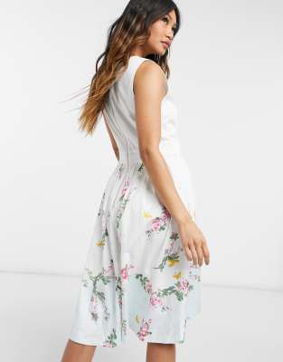 white sleeveless floral dress