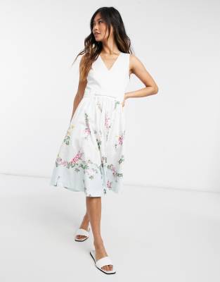 white sleeveless floral dress