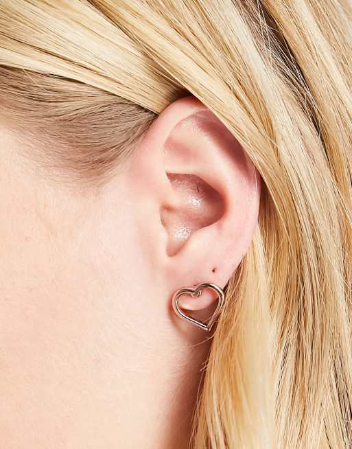 Ted Baker – Hunti Chain of Hearts – Herzförmige Ohrringe in Roségold-Optik mit Zierausschnitt