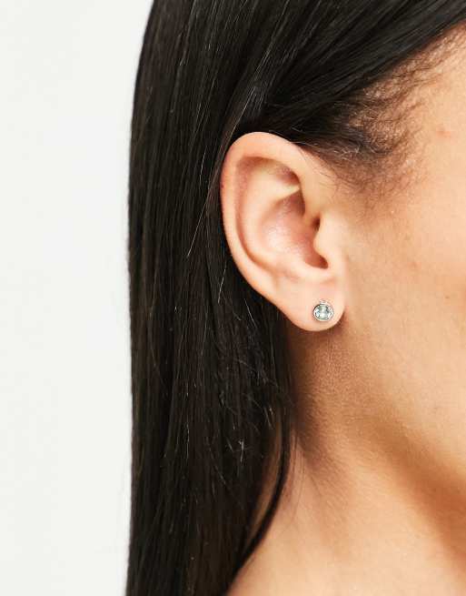 Ted Baker - Sinaa - Fonkelende oorknopjes met blauw kristal in zilver