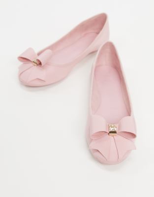 pink flat pumps