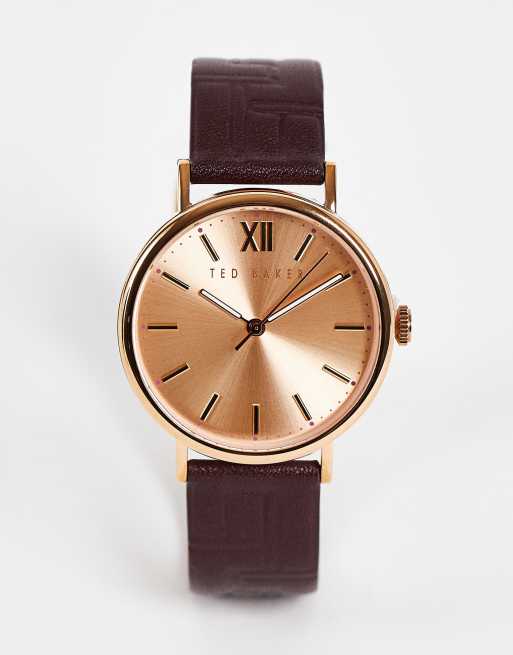 Ted Baker – Zegarek ze stali nierdzewnej ze złotą tarczą i skórzanym wytłaczanym paskiem w kolorze bordowym