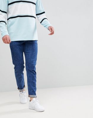 фото Темно-синие эластичные джинсы узкого кроя в стиле ретро asos-синий asos design