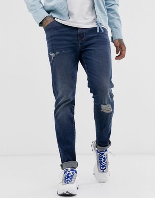 фото Темно-синие выбеленные зауженные джинсы с рваной отделкой asos design-синий