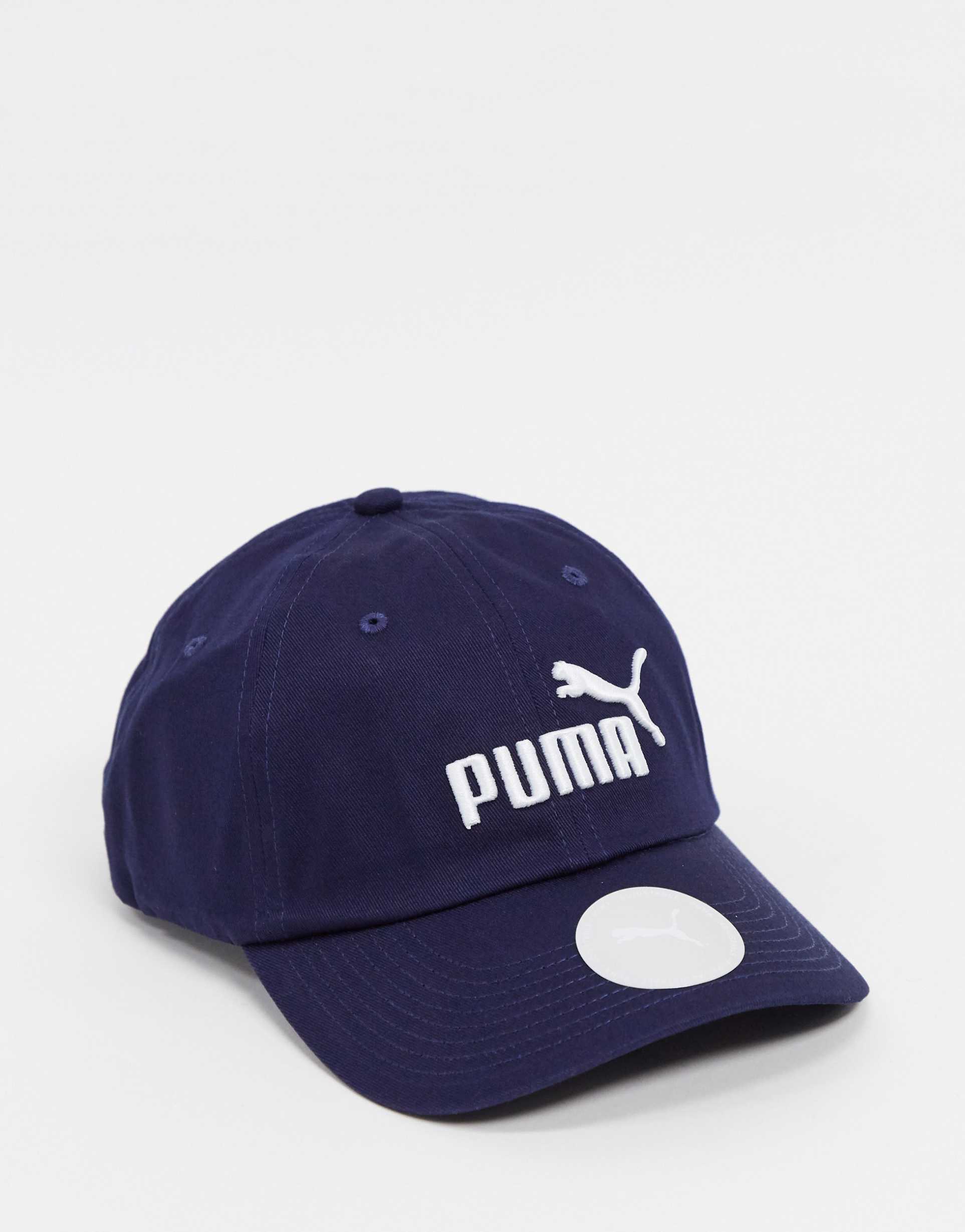 Кепка темно синий. Бейсболка Puma Dry Cell. Puma Dry Cell кепка. Темно-синяя кепка Puma. Puma Essentials cap.