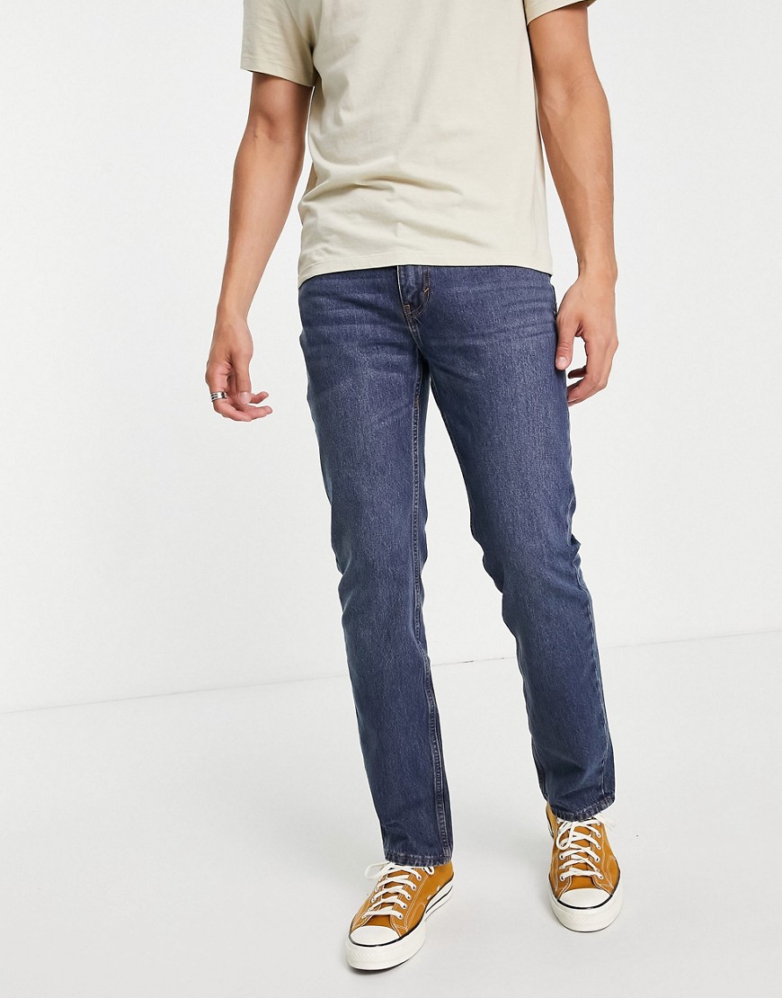 фото Темно-выбеленные джинсы узкого кроя в винтажном стиле levi's skateboarding 511-голубой levis skateboarding