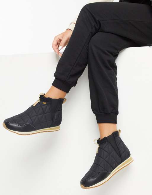 Teva Ember Mid pull on boots in quilted black ASOS