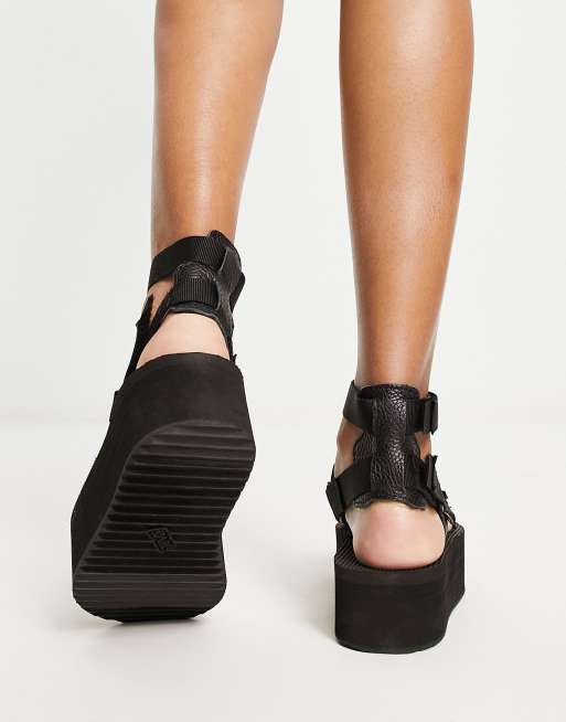 Teva flatform mevia gladiator chunky sandals in black ASOS