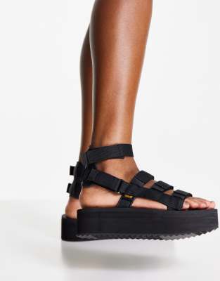 black gladiator flatforms