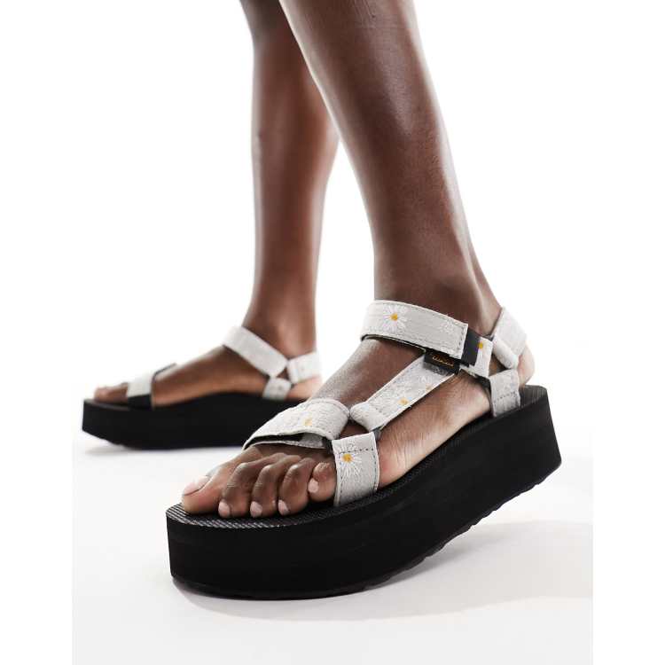 Teva flatform Universal sandals in grey daisy ASOS