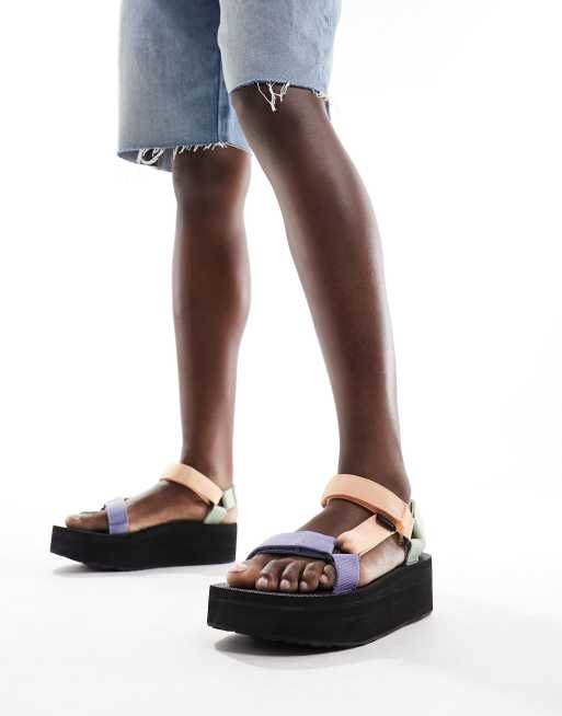 Teva flatform Universal sandals in sherbert | ASOS