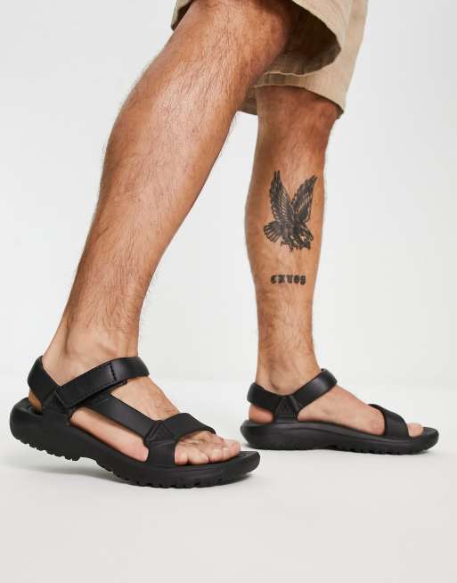 Teva Hurricane Drift eva sandals in triple black ASOS