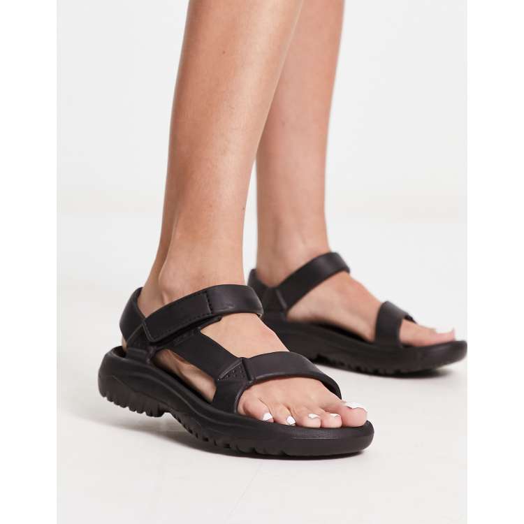Teva Hurricane drift sandal in black ASOS