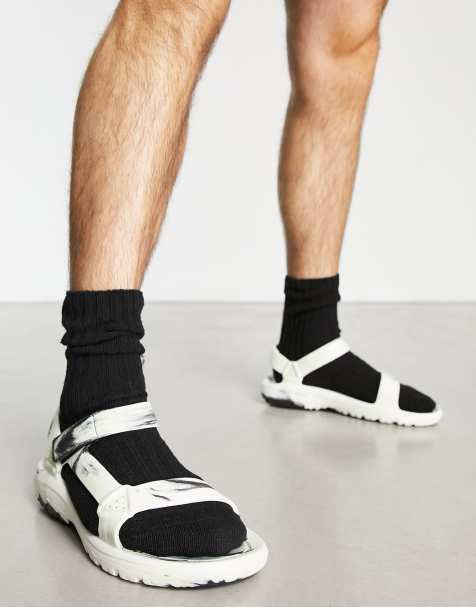 Teva Hurricane drift sandals in black marble - view 1