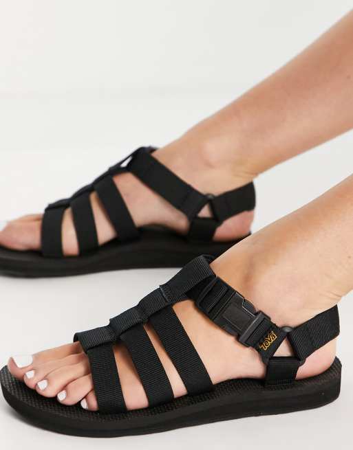 Teva Original Dorado caged flat sandals in black ASOS