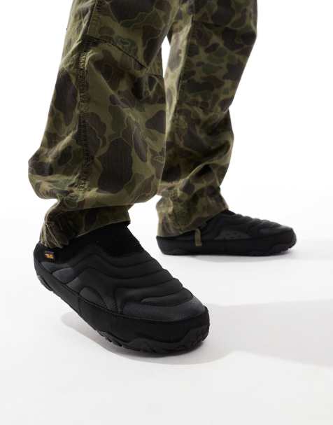 Teva ReEmber Terrain slip on padded mules in black - view 1