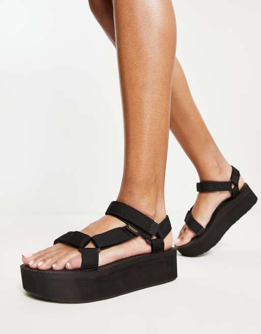 Teva Universal flatform sandals in black ASOS