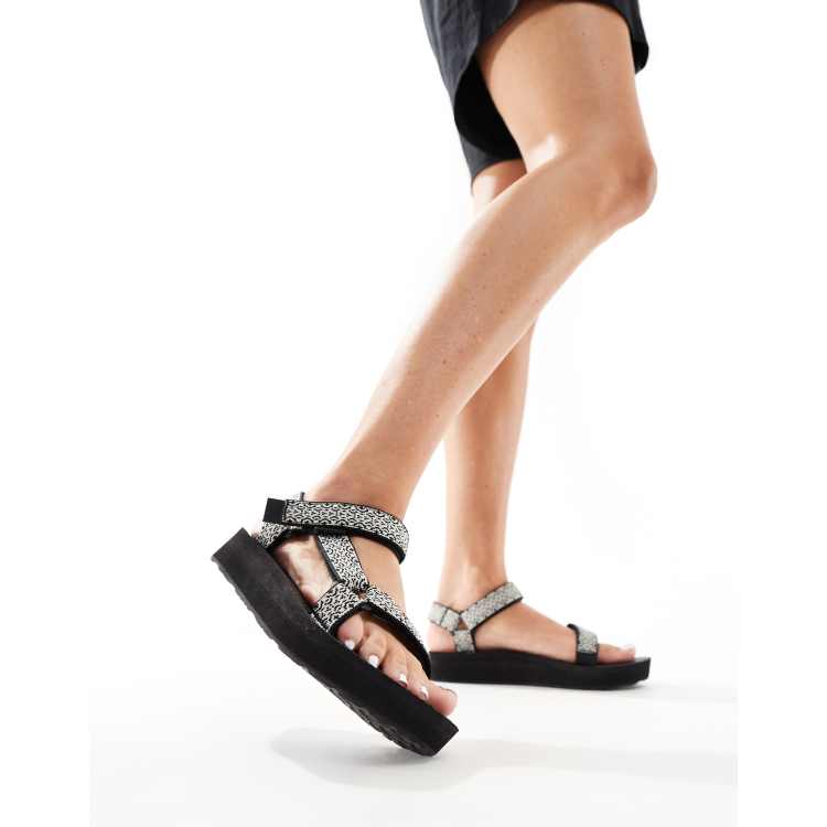 Teva Universal midform chunky sandals in black ASOS