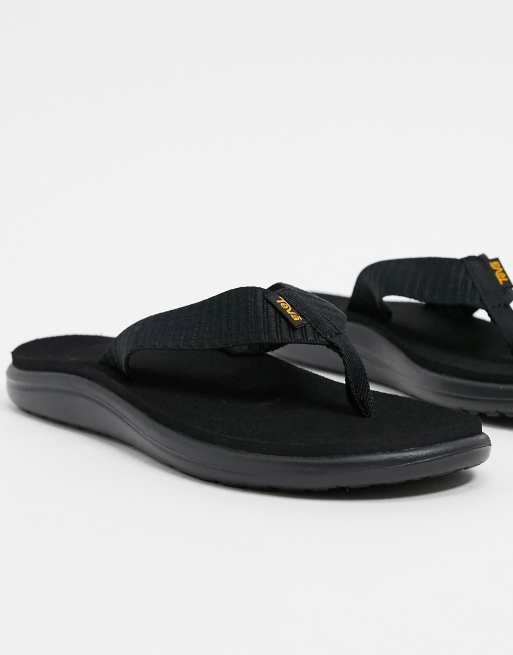 Teva Voya Flip Bar flip flops in black | ASOS