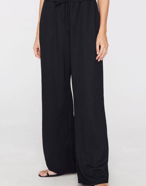 Tezenis Crinkle palazzo trousers in black - view 1
