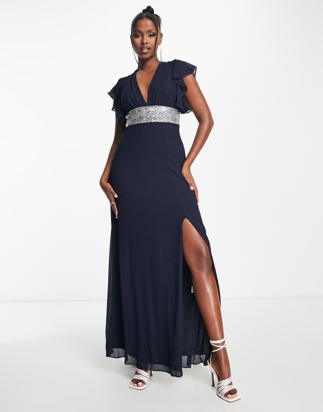 TFNC - bridesmaid chiffon maxi dress with flutter sleeve and embellished waist in navy