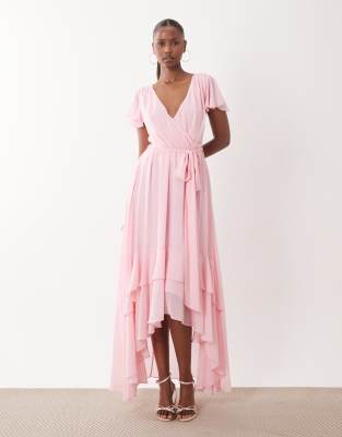 TFNC Bridesmaid chiffon v neck tie detail asymmetric hem maxi dress in baby pink