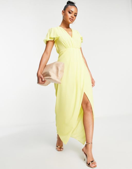 TFNC Bridesmaid chiffon wrap front maxi dress with flutter sleeve in lemon yellow ASOS