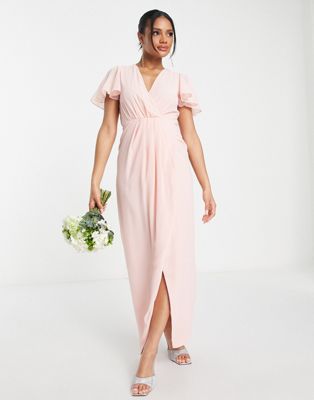 TFNC Bridesmaid chiffon wrap front maxi dress with flutter sleeve in whisper pink