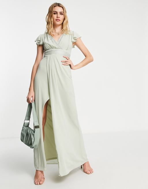 TFNC Bridesmaid flutter sleeve v neck dress in sage green