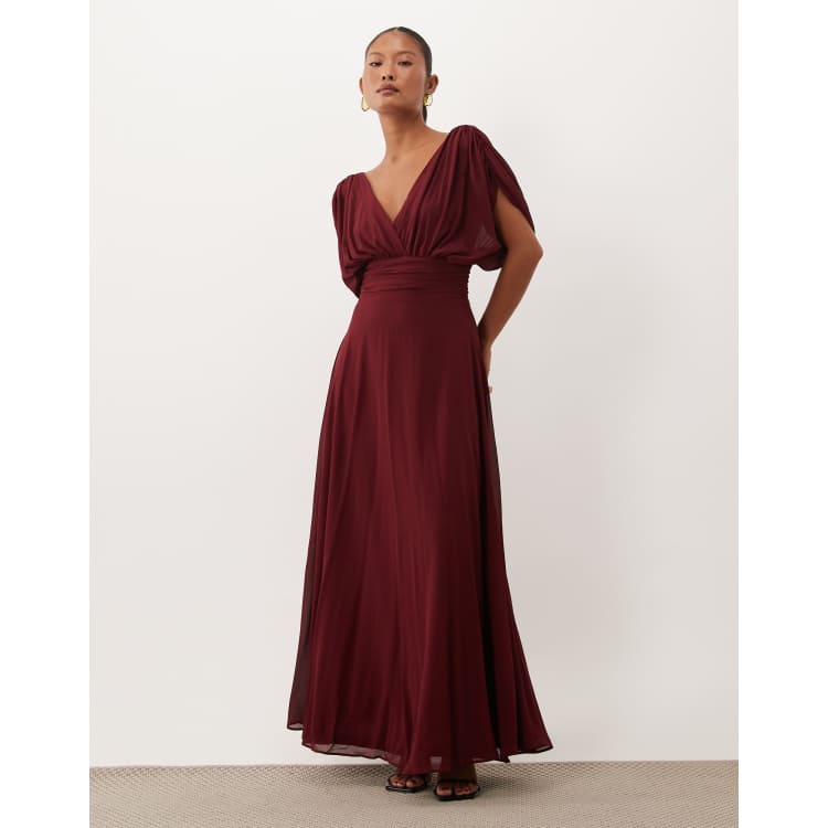 TFNC Bridesmaid Petite chiffon v-neck draped sleeve pleated maxi dress in burgundy