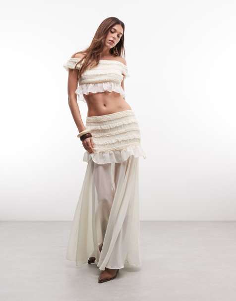 TFNC - Conjunto color crema de falda larga transparente y top corto con escote Bardot y volante - view 1