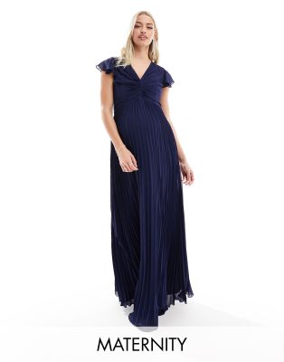 TFNC Maternity Bridesmaid chiffon maxi dress with flutter sleeve and  pleated skirt in navy | ASOS