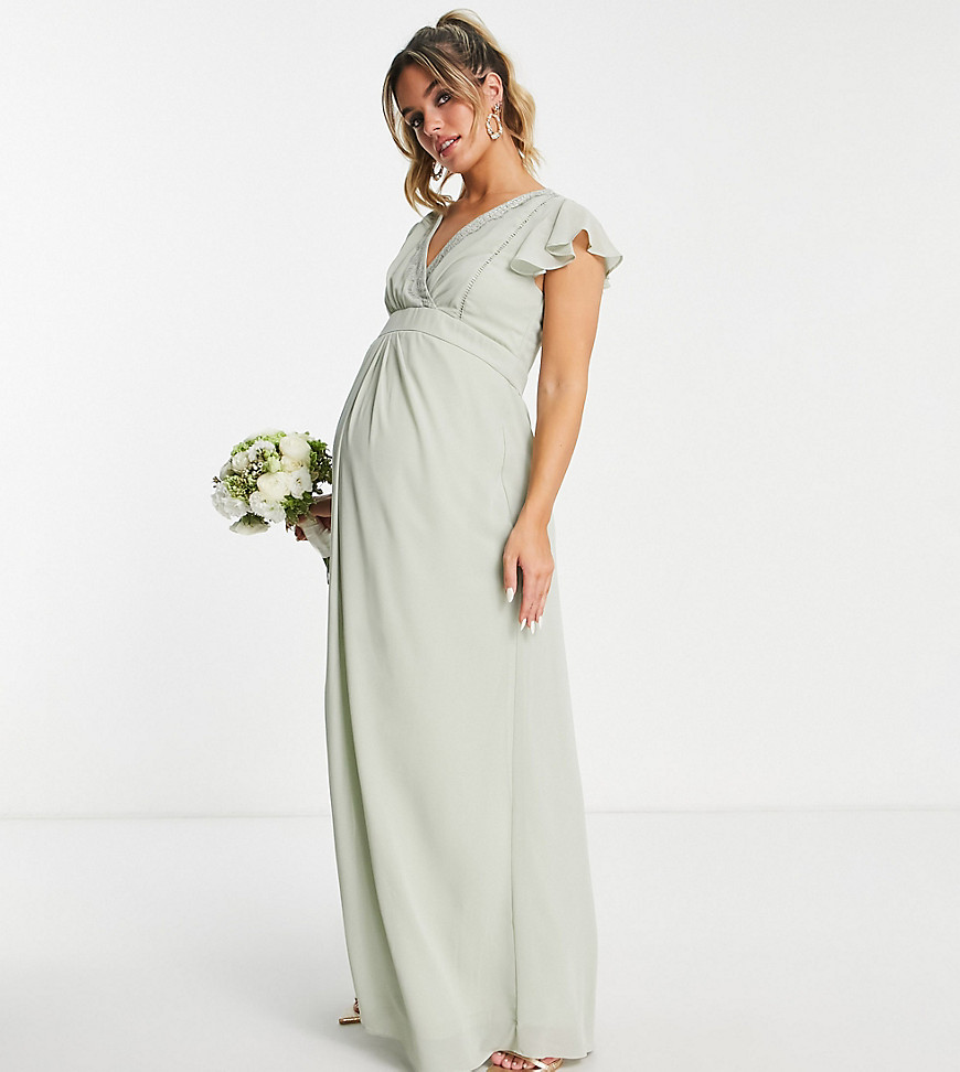 TFNC Maternity Bridesmaid flutter sleeve ruffle detail dress in light sage-Green