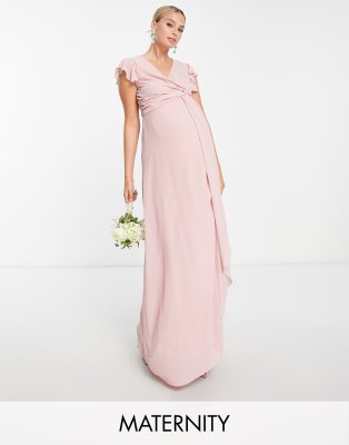 TFNC Maternity - Bridesmaid - Maxikleid in Blush mit Flatterärmeln und Rüschen-Rosa