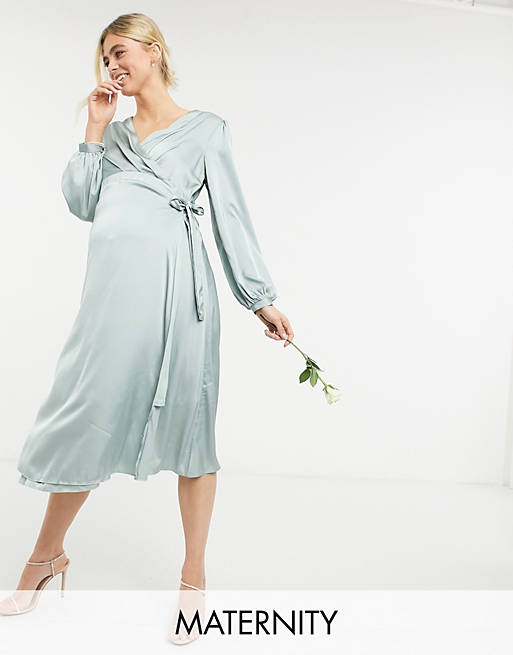 Dresses TFNC Maternity bridesmaid satin long sleeve wrap front midi dress in sage 