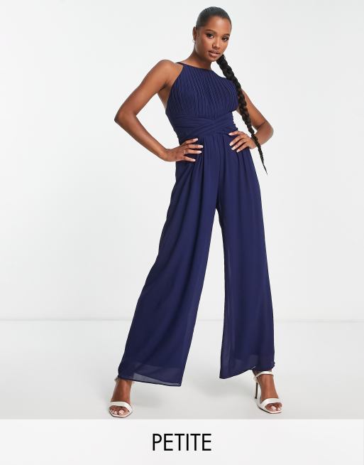 TFNC Petite Bridesmaid pleated halter neck wide leg jumpsuit in navy | ASOS