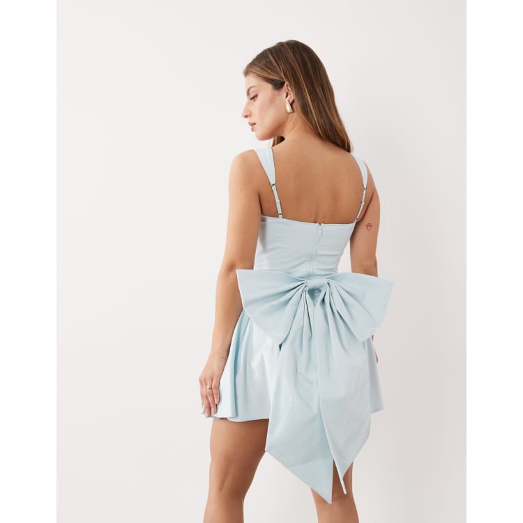 TFNC Petite corset pleated mini dress with bow back in blue | ASOS