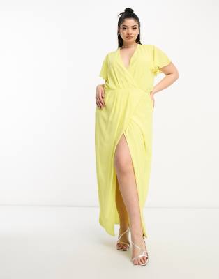 TFNC Plus Bridesmaid chiffon wrap front maxi dress with flutter sleeve in lemon yellow - ASOS Price Checker