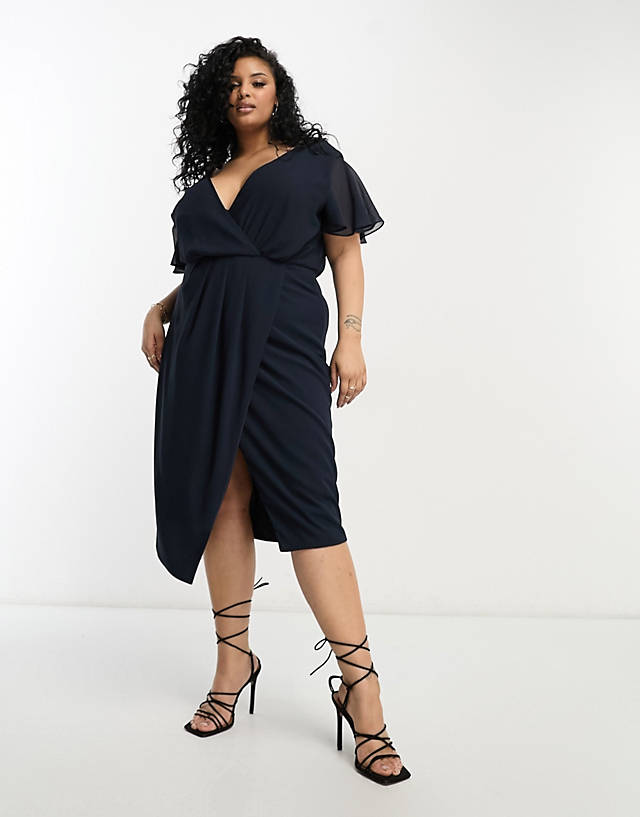 TFNC Plus - bridesmaid chiffon wrap front midi dress with flutter sleeve in navy
