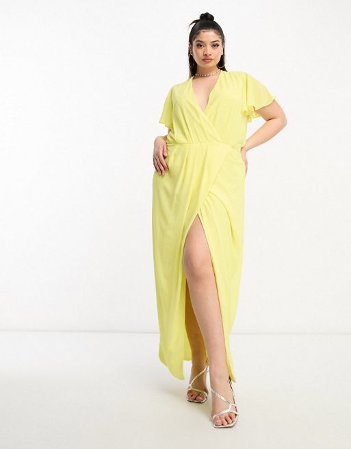 TFNC Plus - L'invitée - Robe portefeuille longue en mousseline avec manches évasées - Jaune citron
