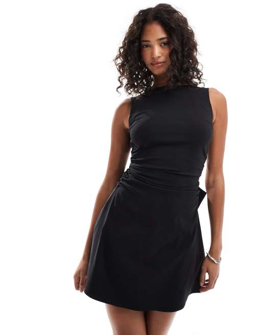 TFNC structured mini dress in bengaline with bow back detail in black 